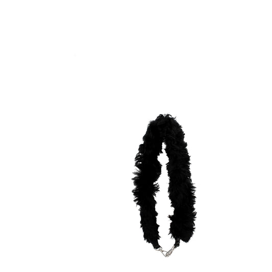 Black feather boa around neck