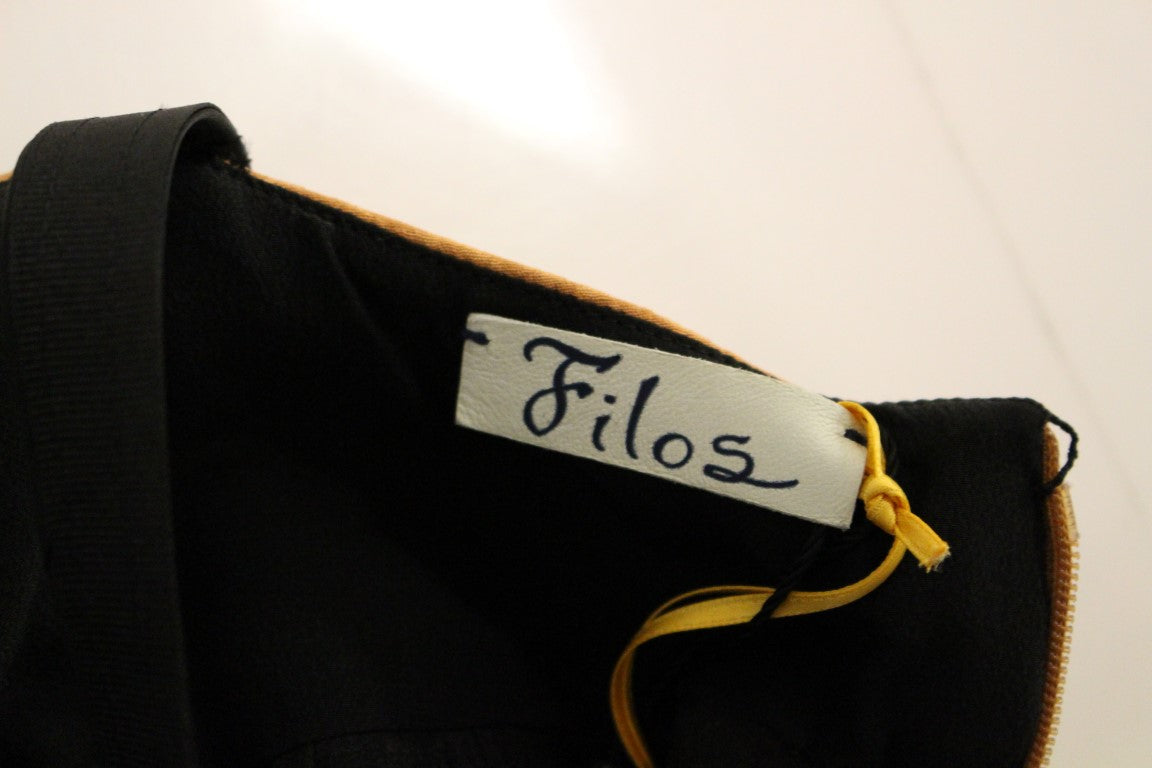 Black backpack with yellow tag and white label
