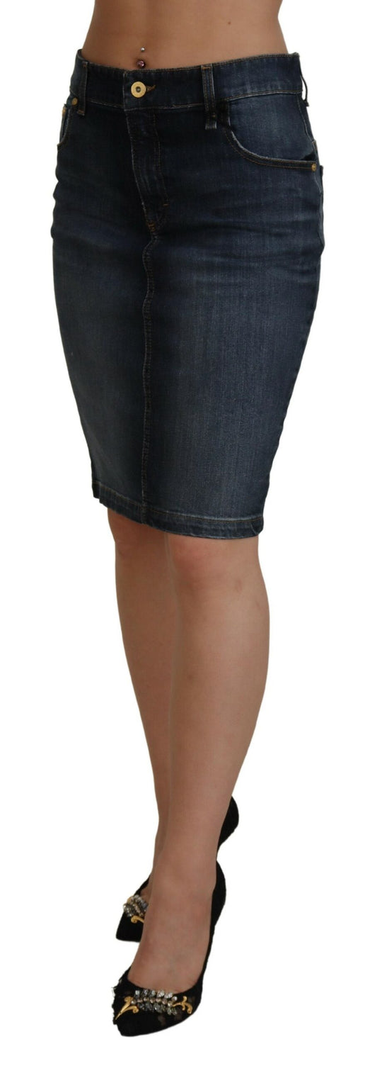 Woman wearing denim skirt and black heels