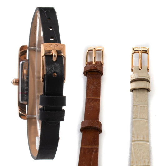 A black leather watch strap with gold accents, a beige leather watch strap, and a brown leather watch strap