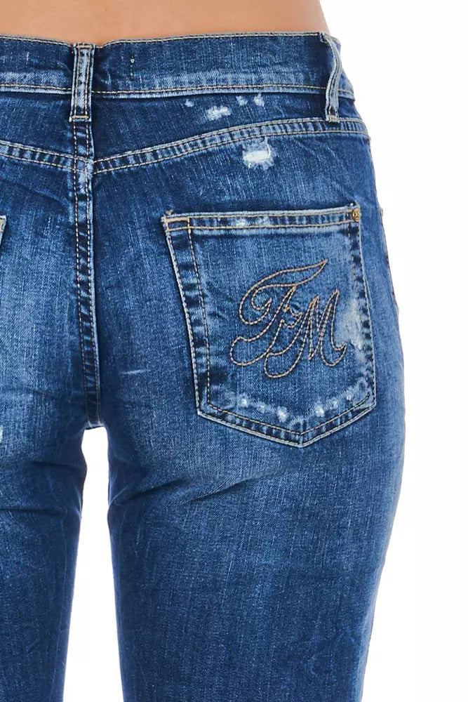 Blue denim jeans with embroidered initials on back pocket