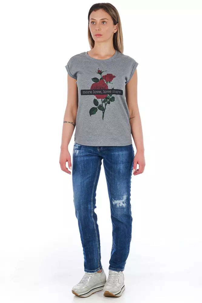 Woman wearing gray t-shirt with red rose design on front