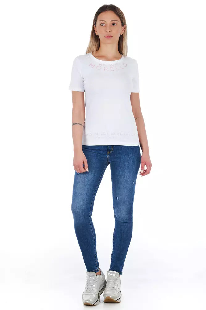 Woman wearing white t-shirt and blue jeans