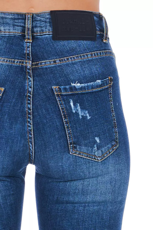 Blue denim jeans with faded areas on thighs