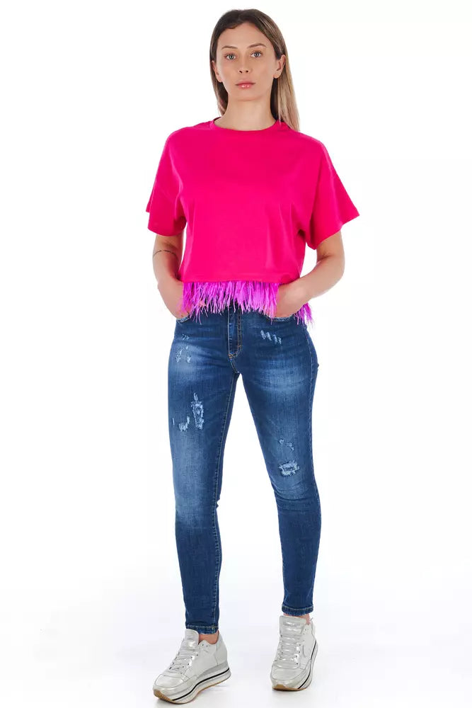 Woman wearing pink shirt and blue jeans