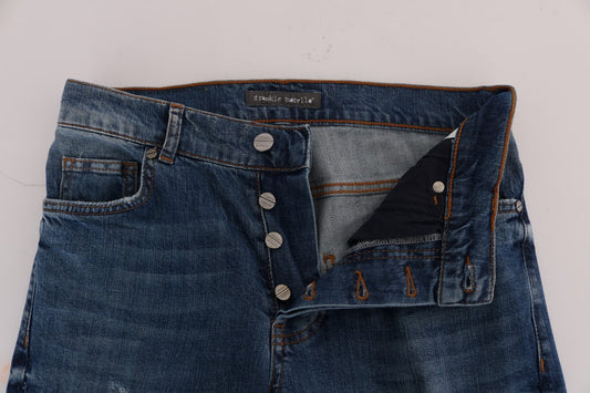 Pair of blue jeans on a white surface