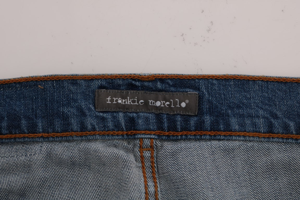 Blue denim jeans with orange stitching on waistband