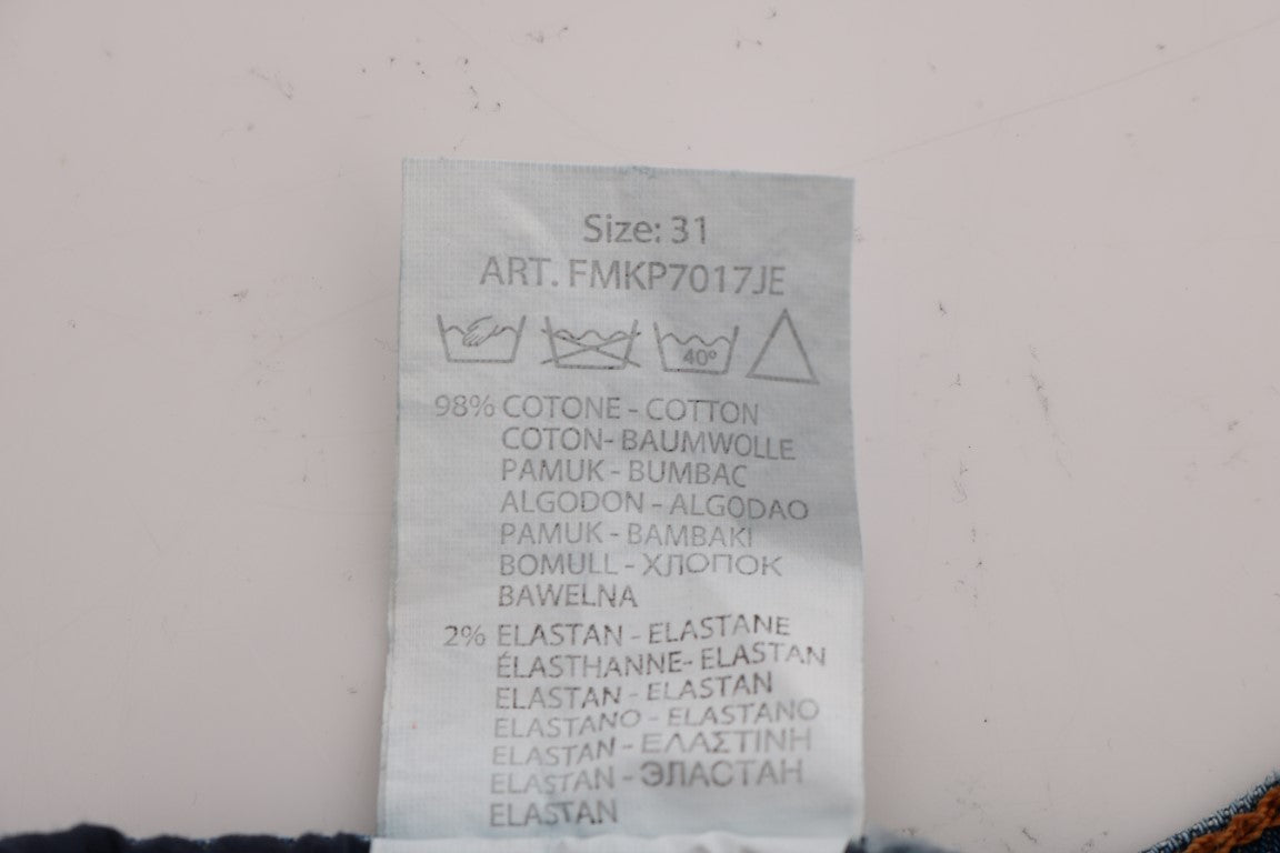 Tag on a piece of clothing indicating size, fabric content, care instructions, and brand name
