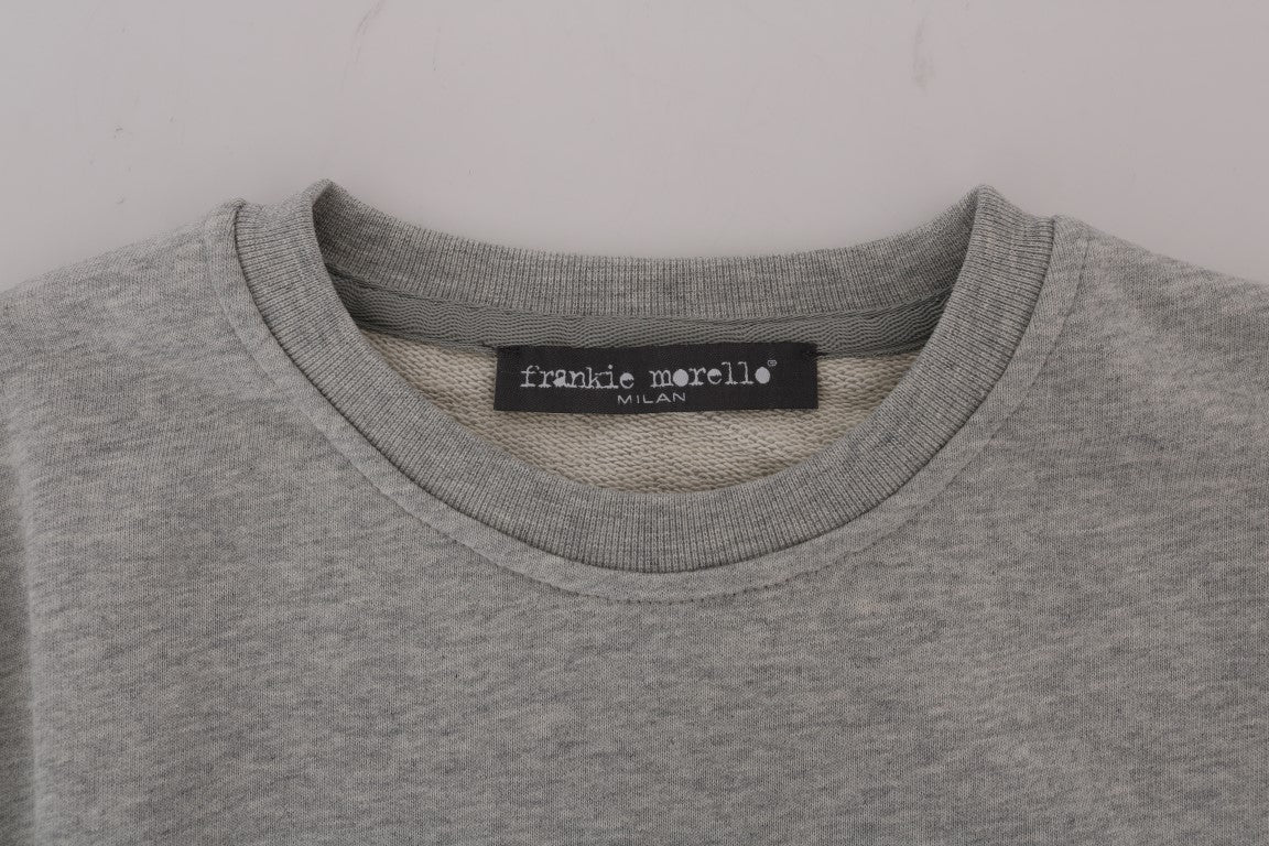 Grey sweater on hanger