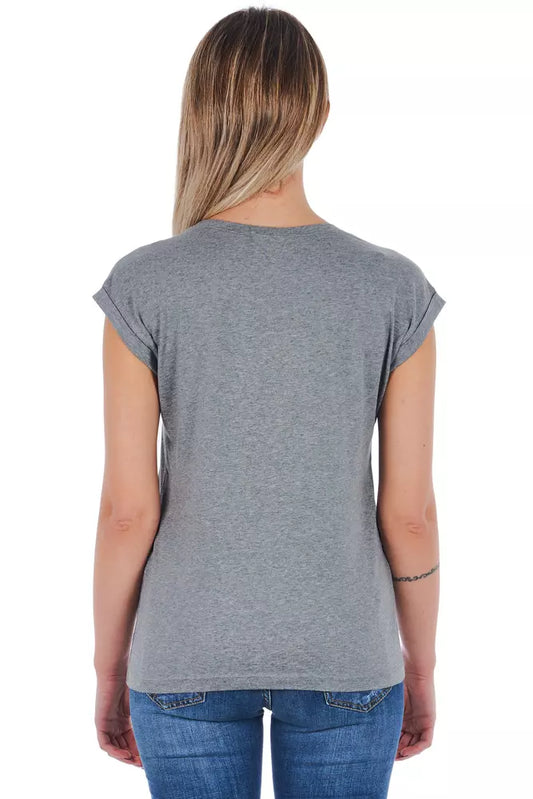 Grey short sleeve t-shirt on woman's back