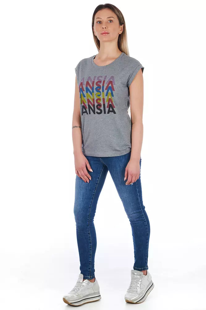Woman wearing gray shirt with rainbow print