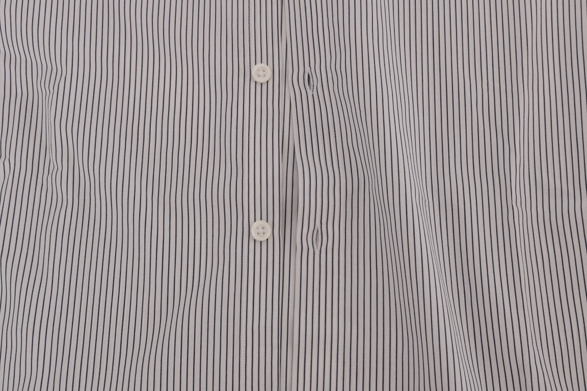 The shirt is striped with a button on the front