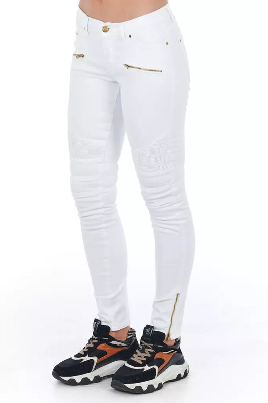 White pants with gold zippers on legs