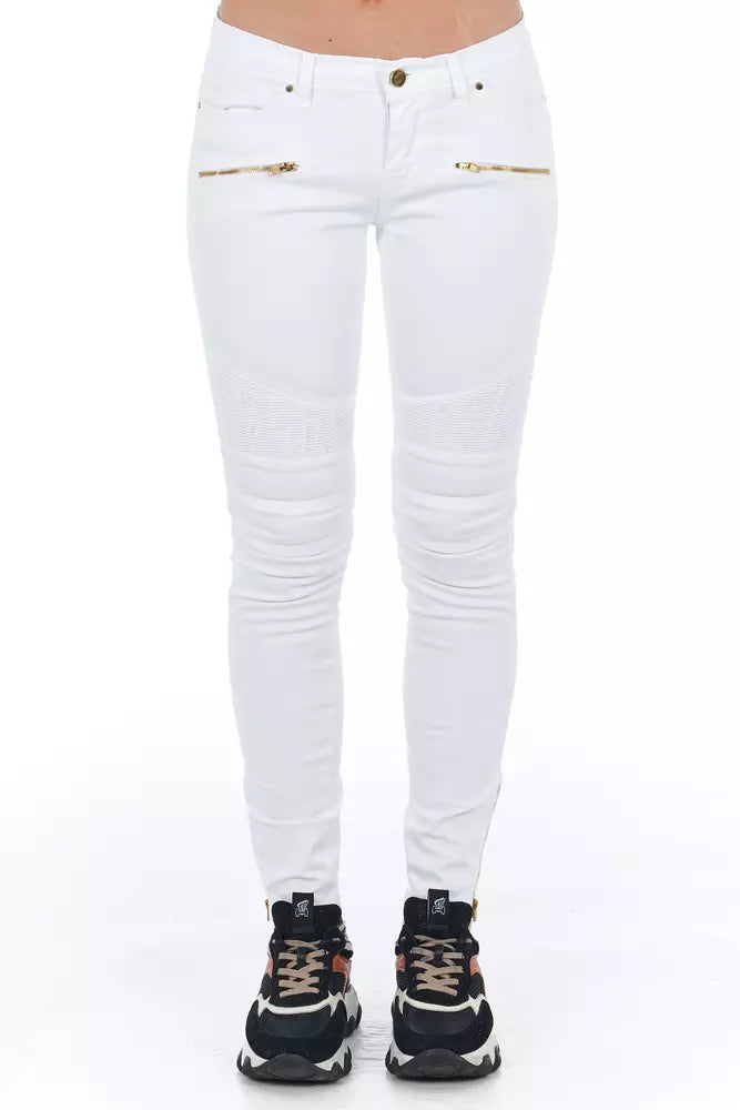 White skinny jeans with zipper details on legs