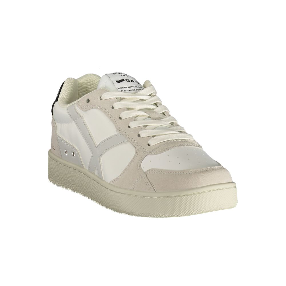 A pair of men's sneakers with white laces, a tan toe cap, and a white sole