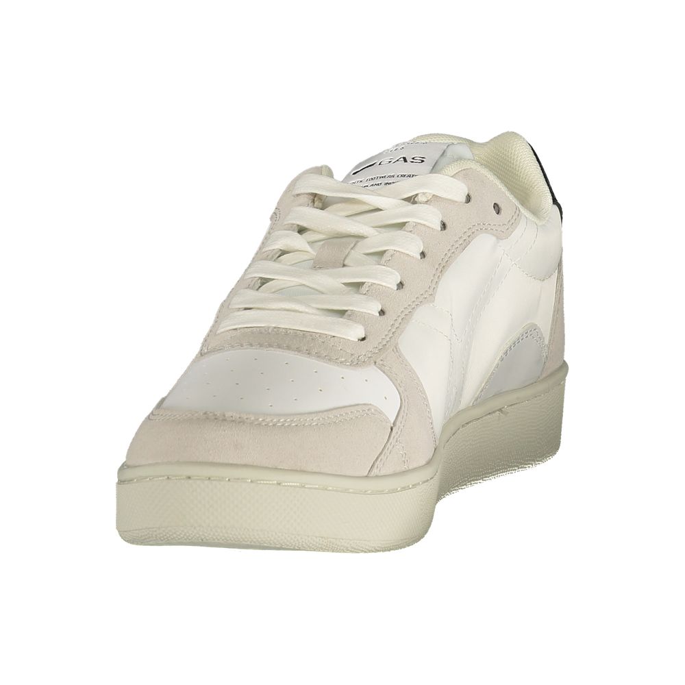 A pair of men's sneakers with white laces, a tan toe cap, and a white sole