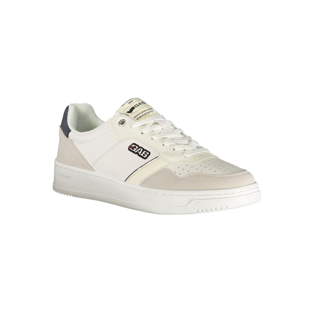 A white sneaker with a black logo on the side