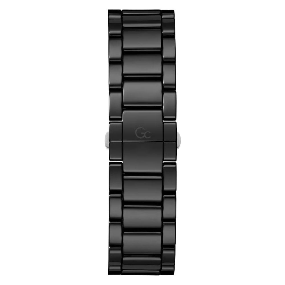 A black ceramic watch with a silver logo on the face