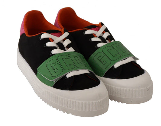 Pair of sneakers with green and black accents