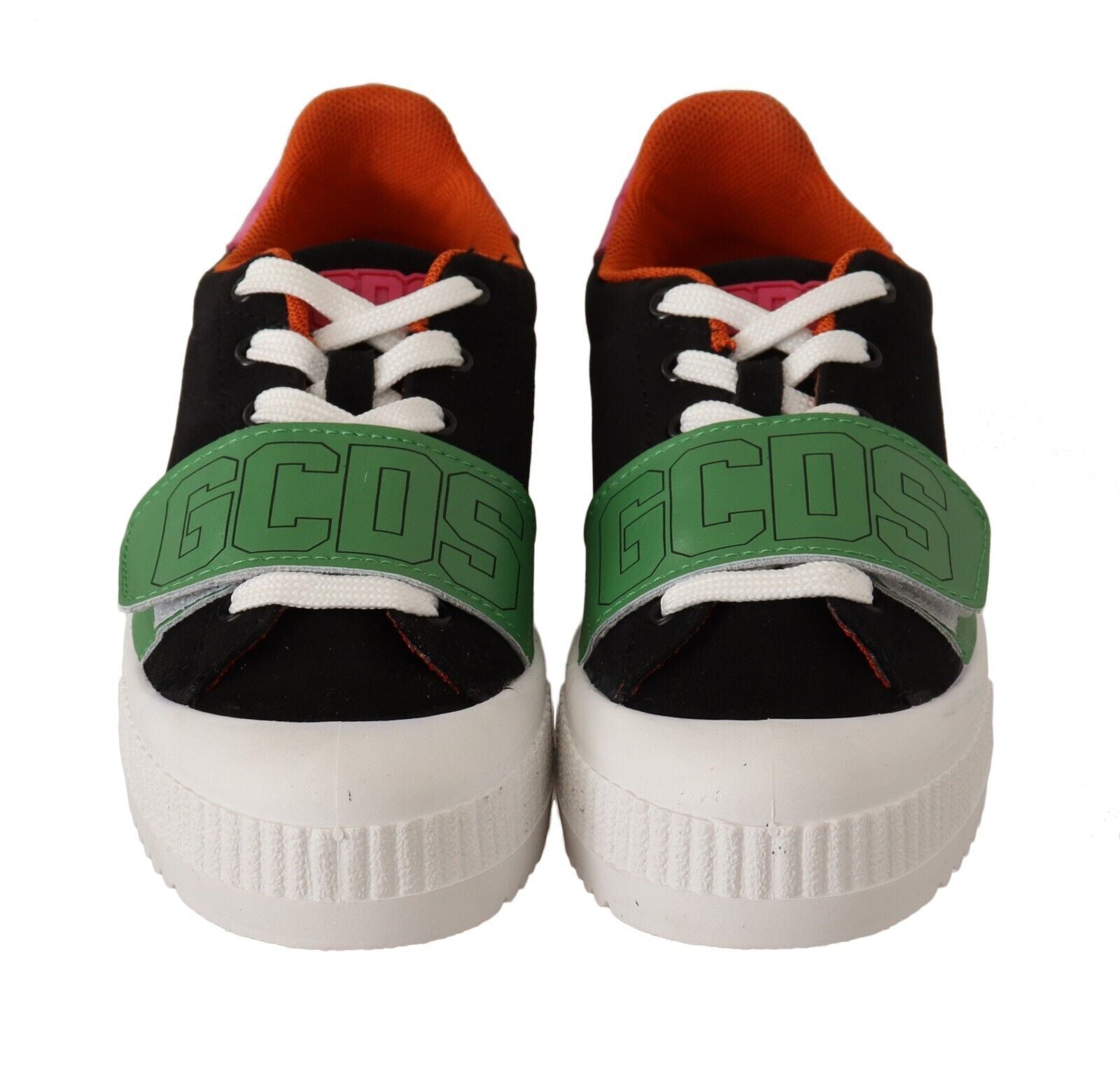 Pair of black and white sneakers with green accents