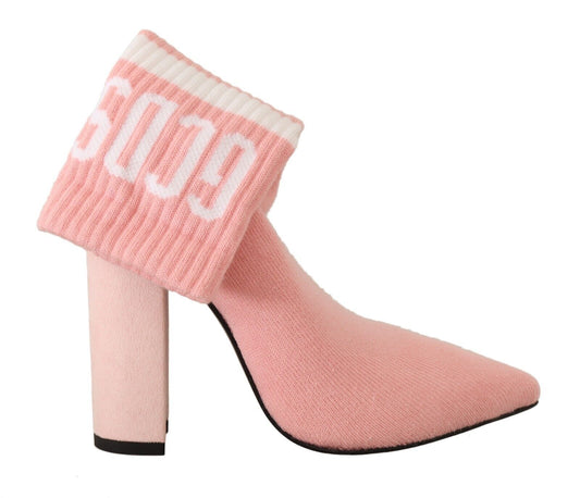 Pink suede boot with white lettering on top