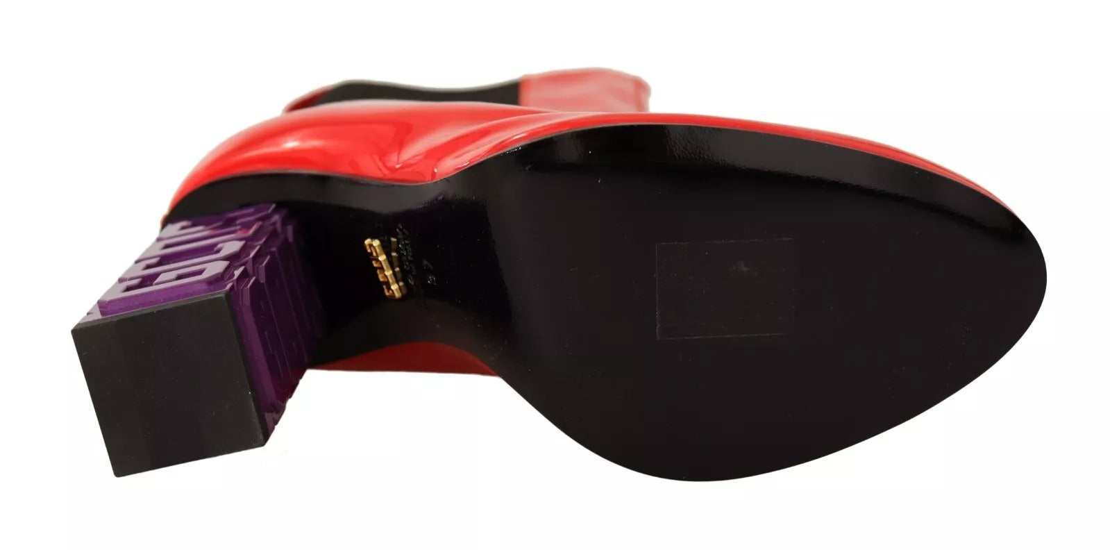 Red and black electronic device with a purple button