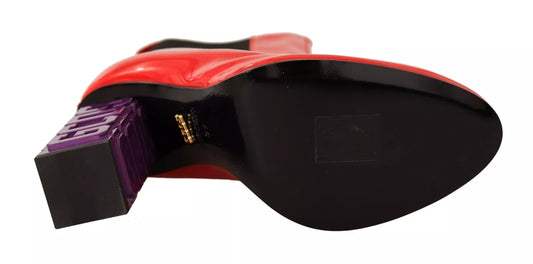 Red and black electronic device with a purple button