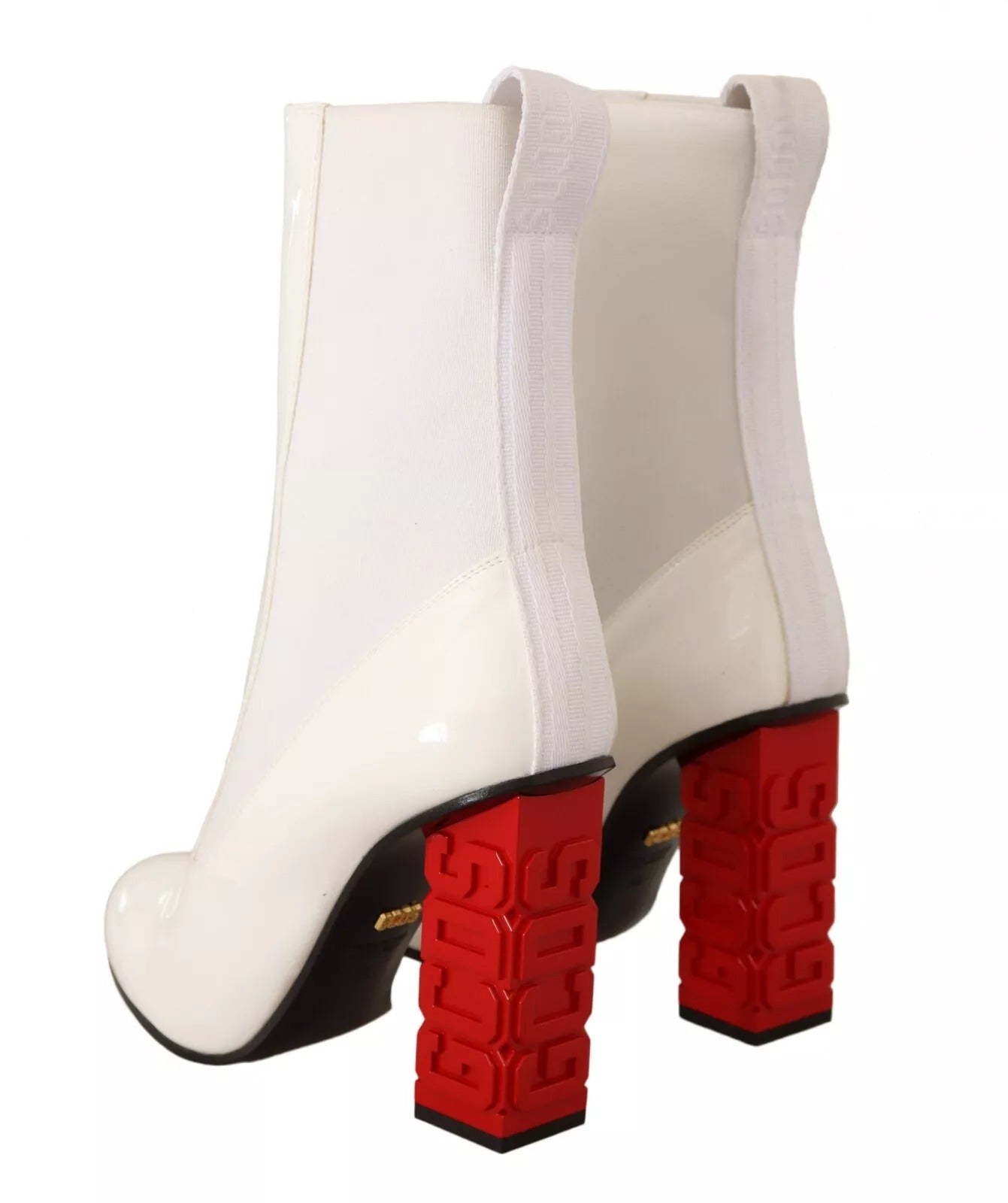 White boot with red soles