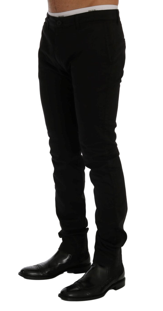 Man wearing black pants and shoes