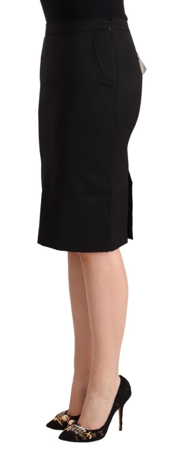 Woman wearing black dress and shoes