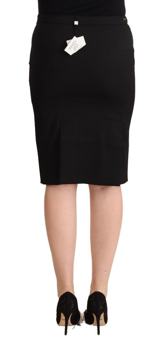 Black skirt worn by a woman standing against a white background