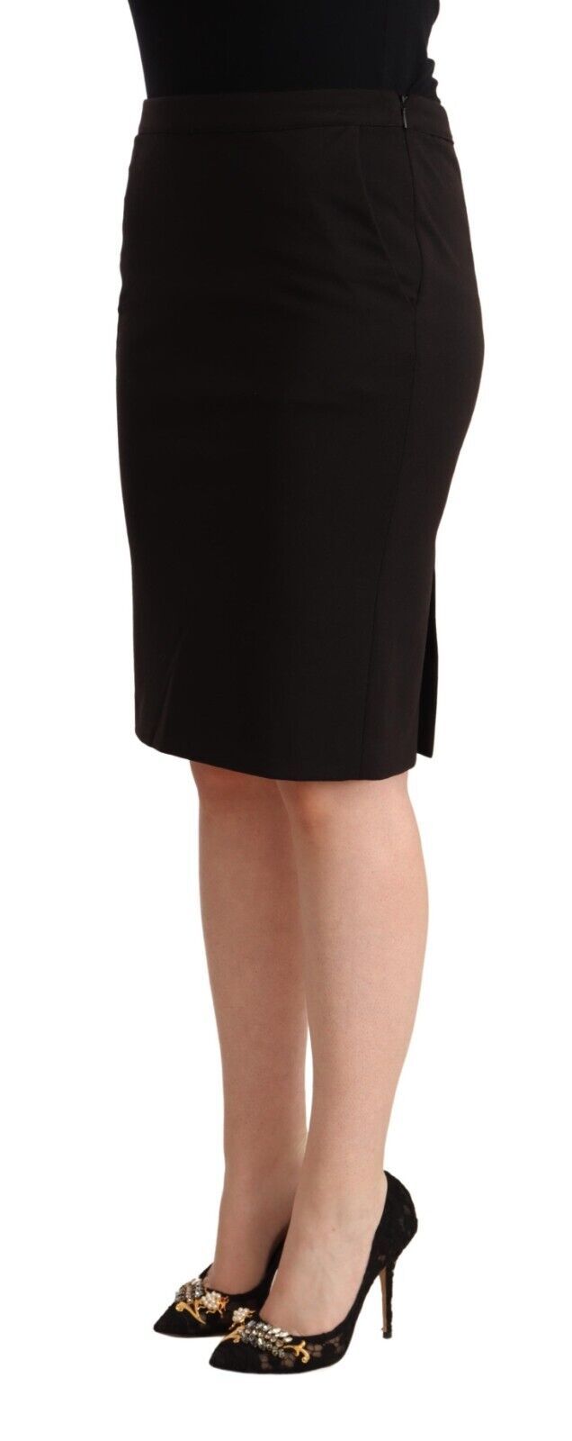 Woman wearing black skirt and heels