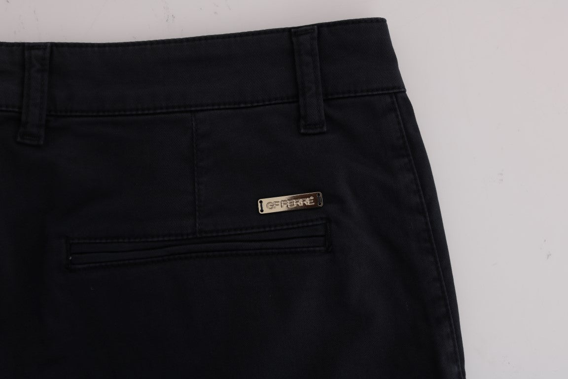 Pair of black jeans with a gold zipper pull