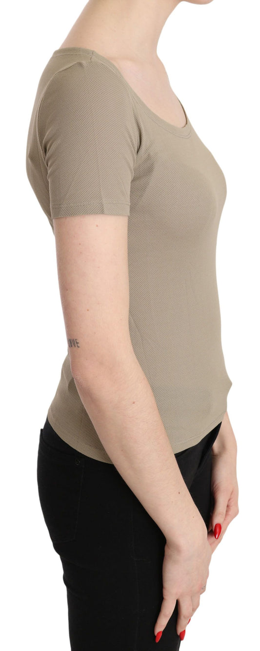 Woman wearing a beige knit top