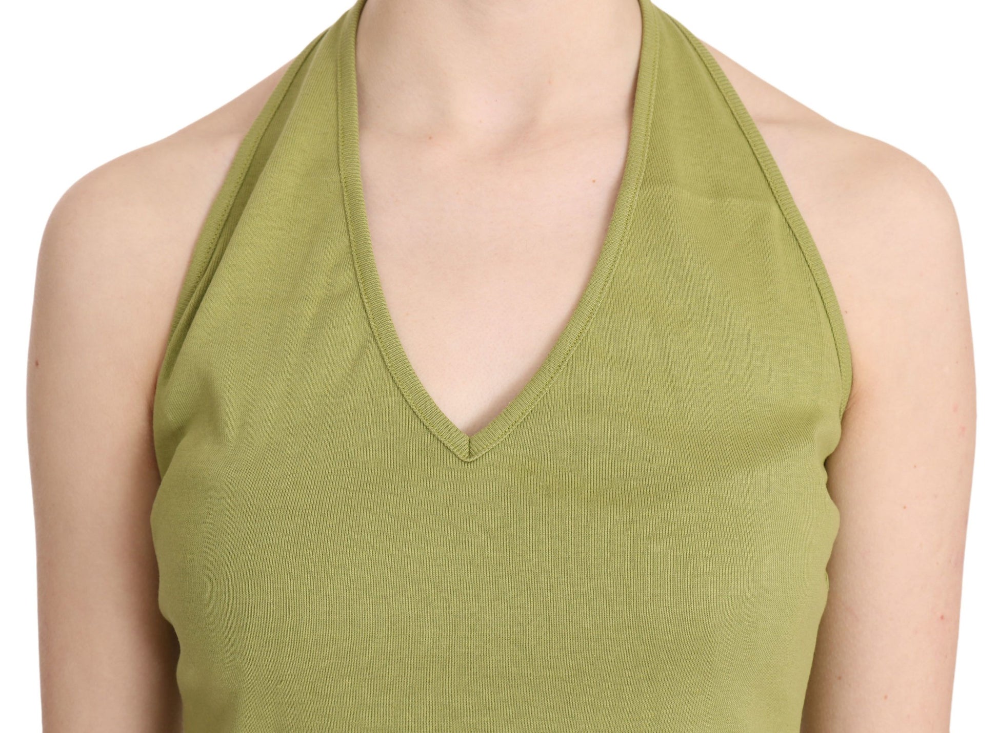 Green tank top on a woman's torso