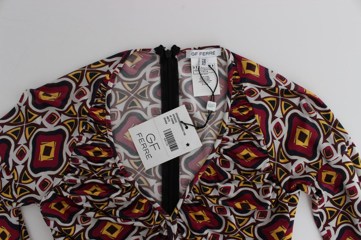 The garment is a long sleeve top with a patterned design