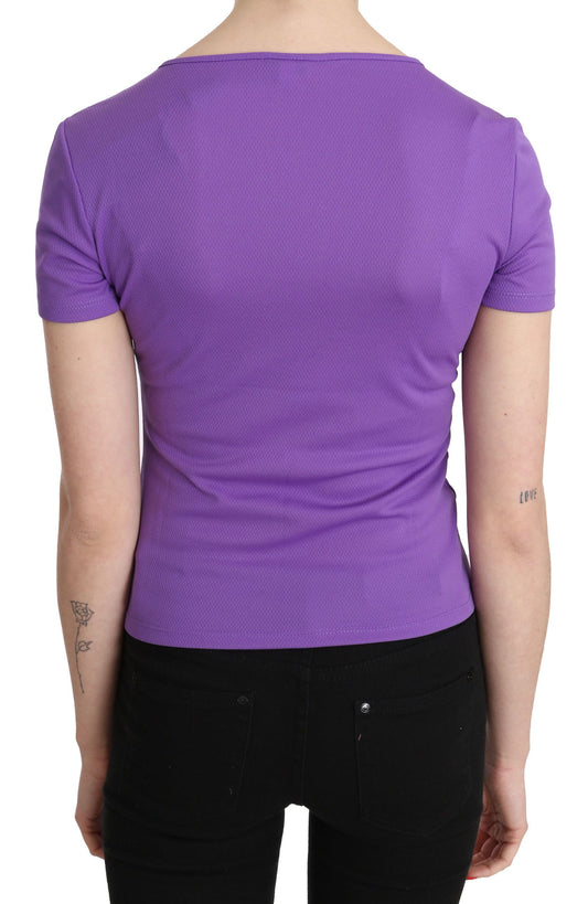 Purple long sleeve shirt on a mannequin