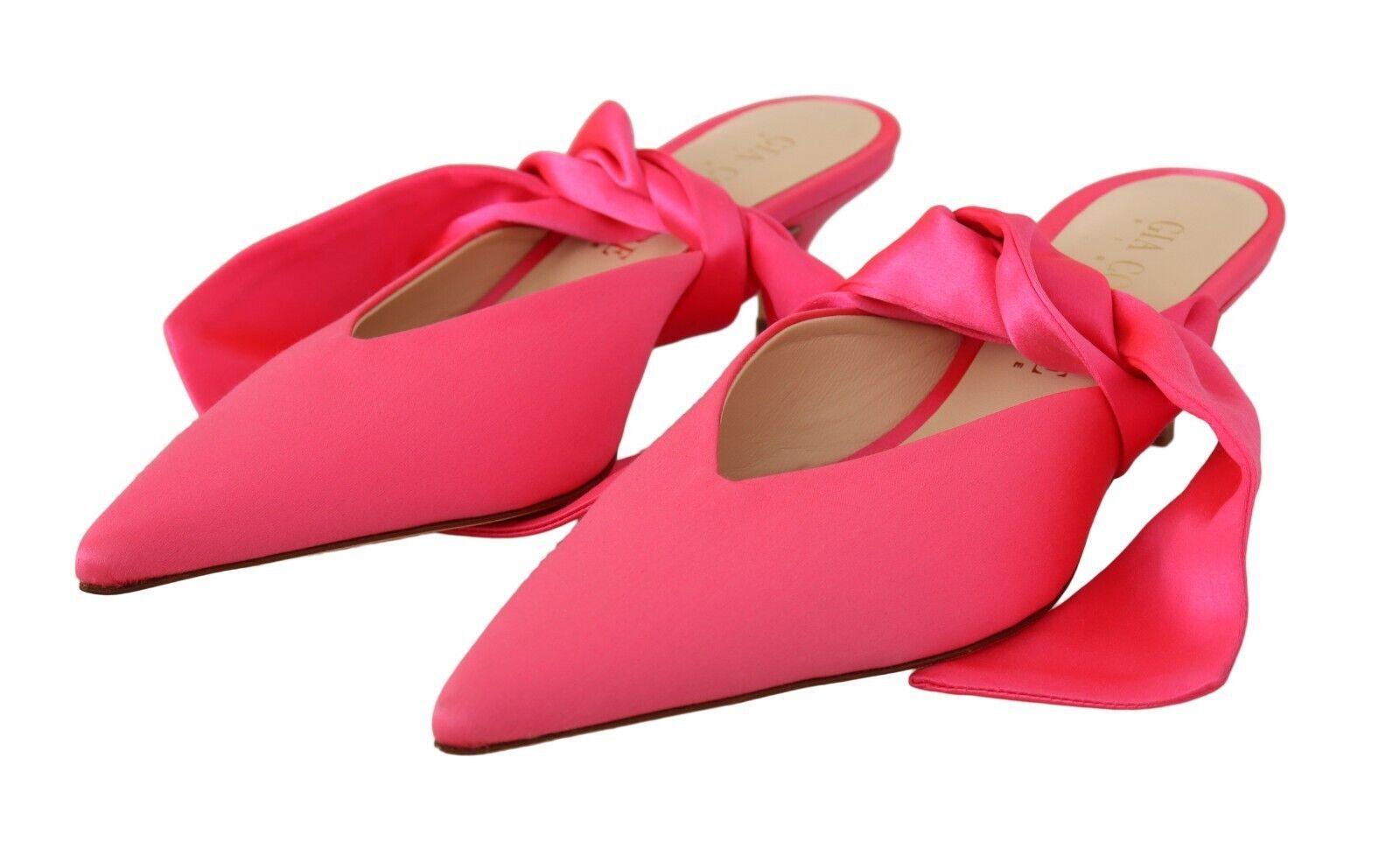 Pair of red ballet flats with ribbon detailing and elastic straps