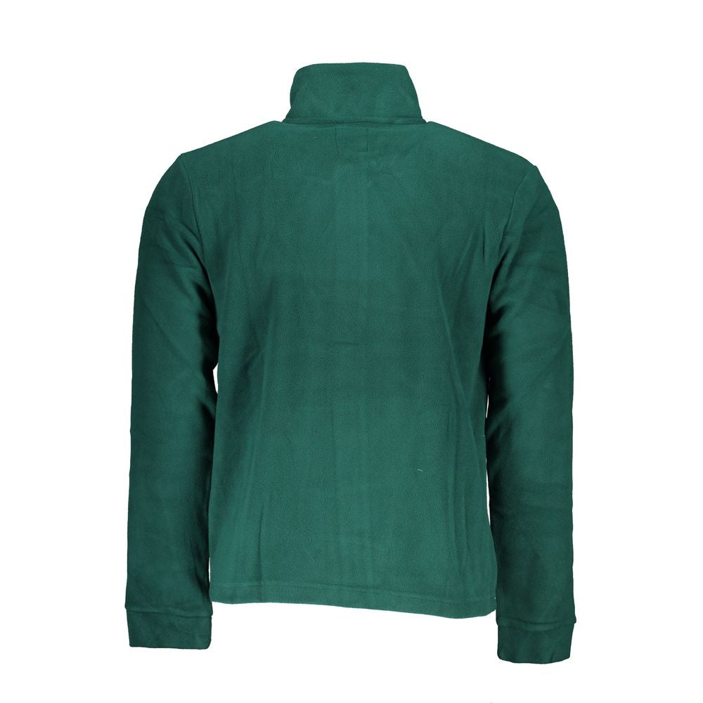 Green velvet jacket on mannequin