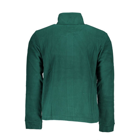 Green velvet jacket on mannequin