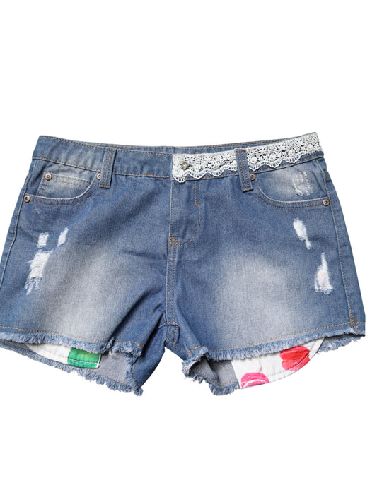 Pair of distressed denim shorts with rips and patches