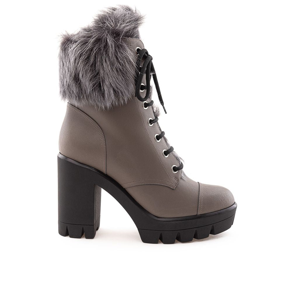Furry winter boot with a high heel