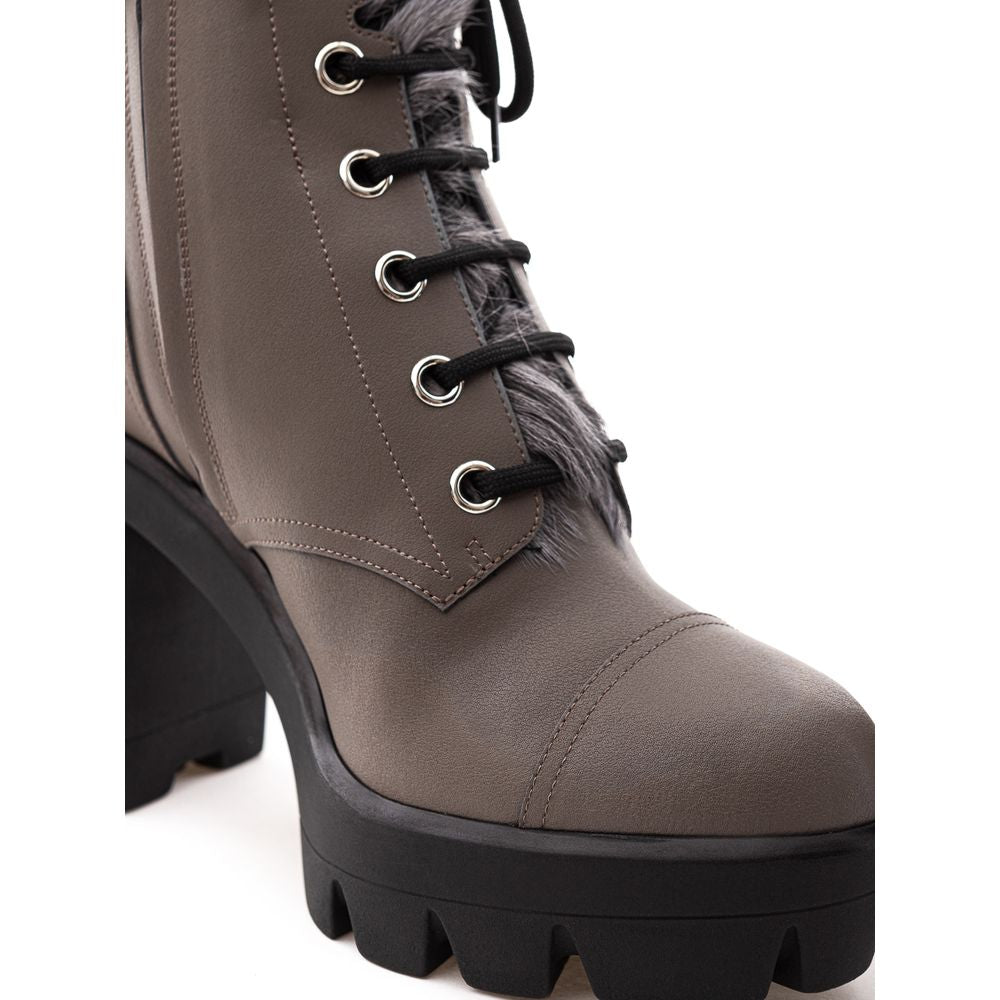 Brown boot with fur trim and black laces