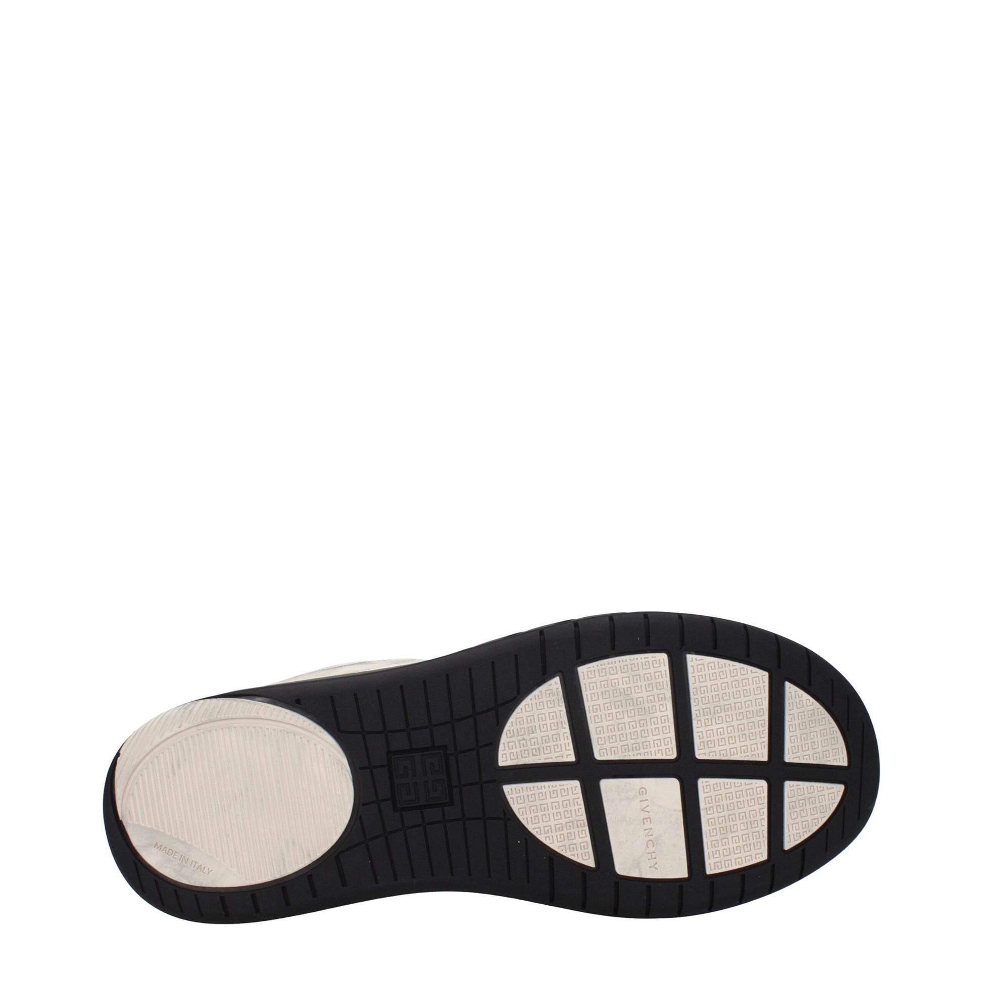 A single beige chunky sneaker with a round toe, lace-up front and a textured sole