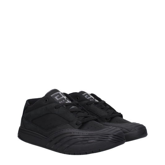 Pair of black fabric low top sneakers with white laces and logo on side
