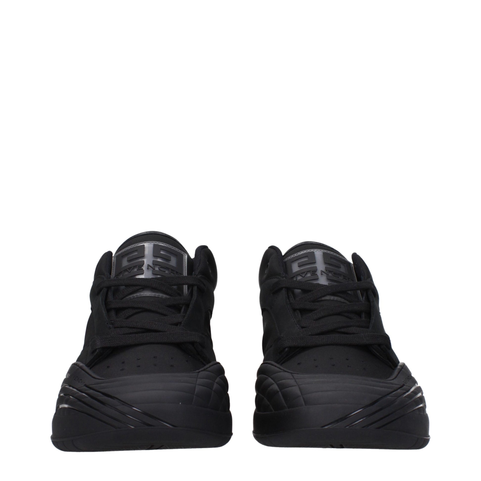 Pair of black fabric low top sneakers with white laces and logo on side