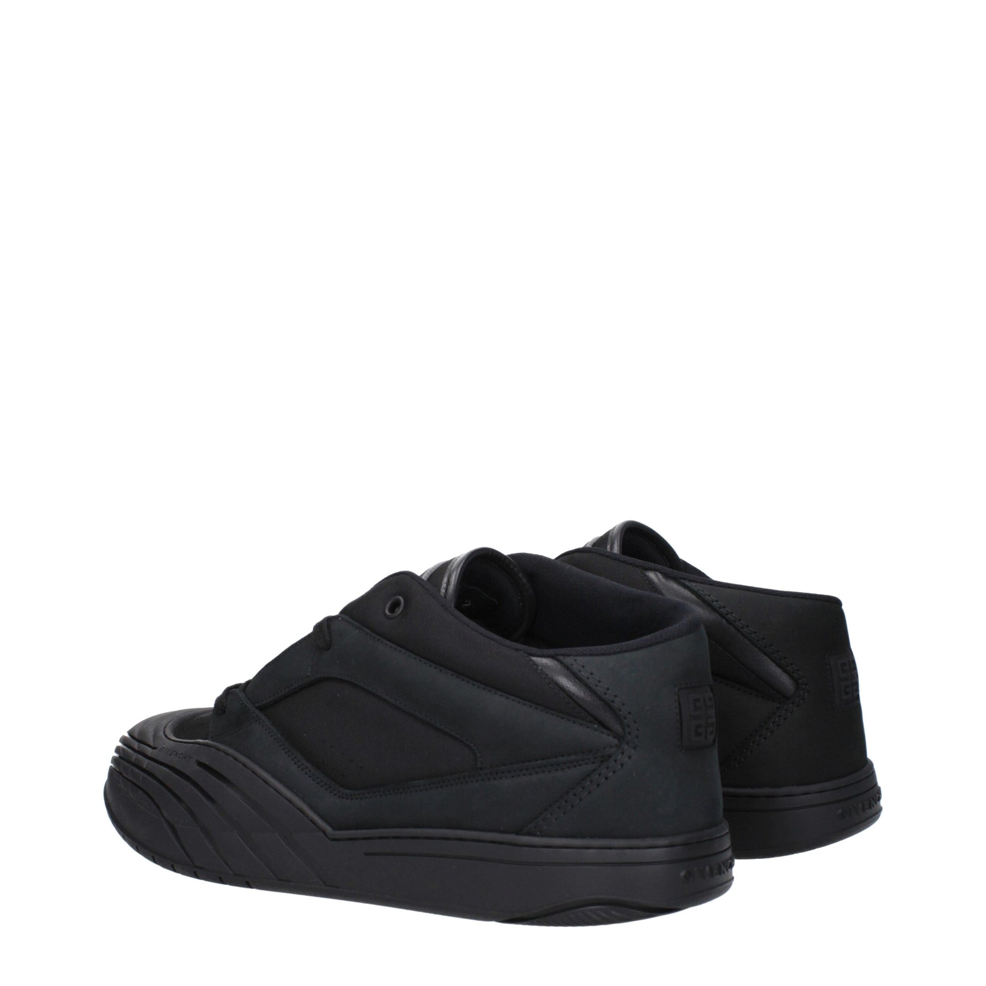 Pair of black fabric low top sneakers with white soles