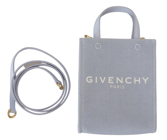 Purse with strap and handle