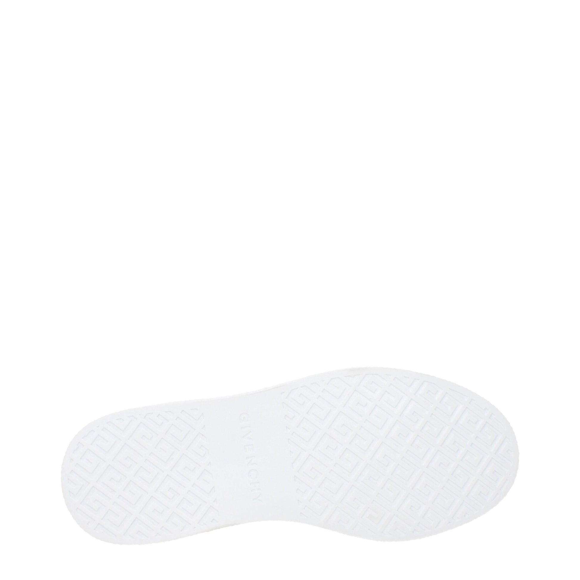 A single white leather sneaker with a low top, featuring a textured sole