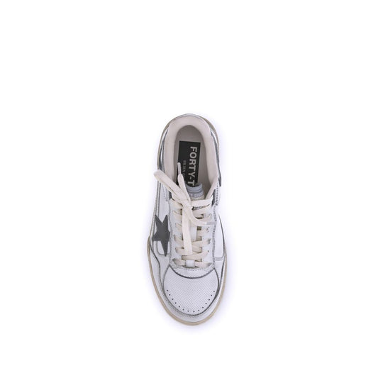 Golden Goose Forty2 sneakers with distressed details and laces on a light-colored background.